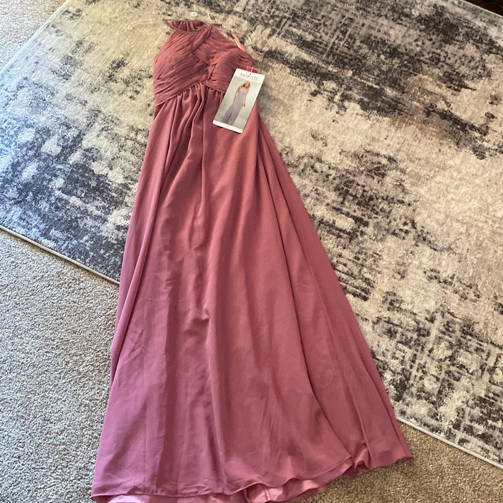 Women’s bridesmaid dress,size 8, rosewood color,never worn.